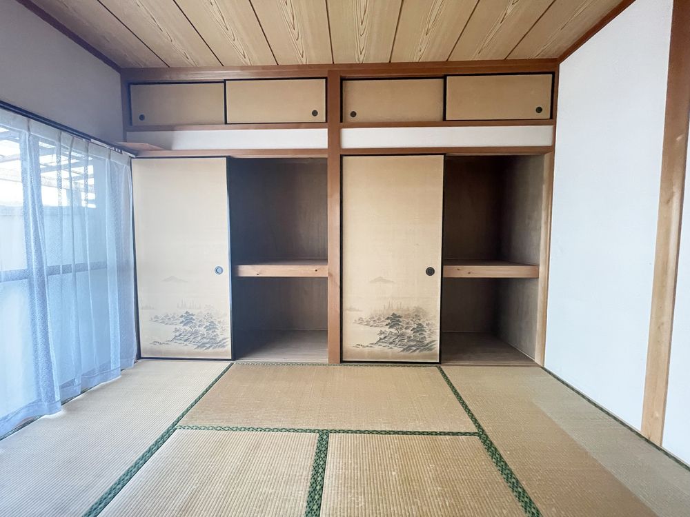 押入